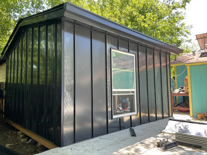 Black standing seam metal wall panels for Roof Inspection in East Port Orchard